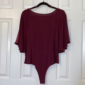 Jennifer Lopez bodysuit snap crotch low back